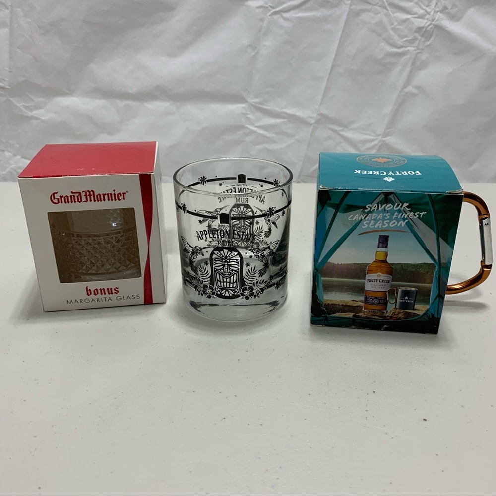 Glass by Grand Marnier and Glass by Appleton Estate Rum and camping mug
